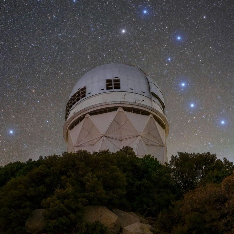 Ground-based observatory shown in the paper's instrument figure.